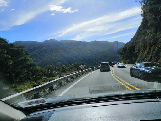 View through front windscreen while driving over Remutaka Ranges