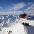 Tourists enjoying a helicopter scenic snow tour in the Christchurch Southern Alps. 