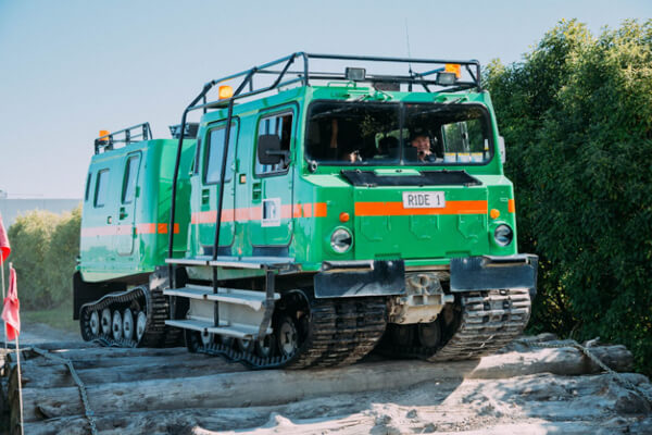 Enjoy a ride on a Hägglund, an all-terrain amphibious vehicle.