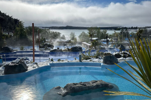 the Tekapo Springs hot pools on a foggy morning.