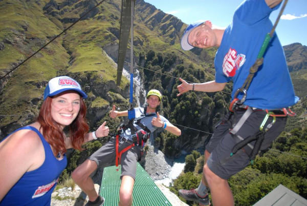 Thumbs up from three people before their epic leap into the Shotover canyon.