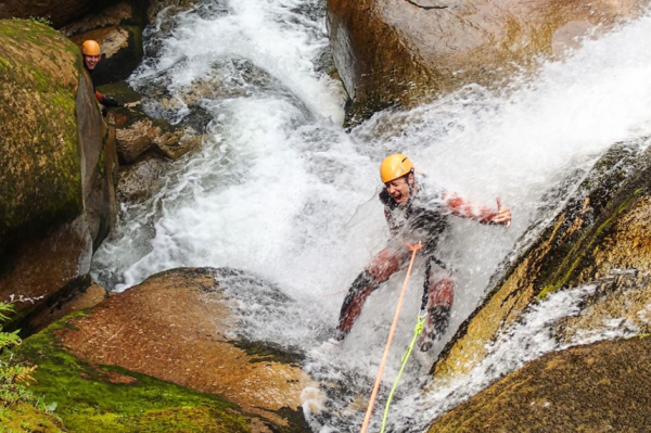 Adventurous tourist enjoying a thrilling tour in the Abel Tasman Canyons.