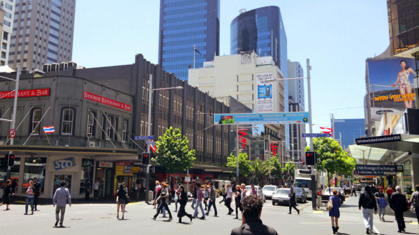 People walking around Queen Street, Auckland.