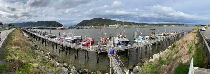 Fishing boats at rest inside the sea wall in Greymouth.