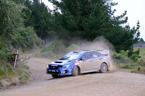 A blue rally car in action in the Hawkes Bay Rally 2021