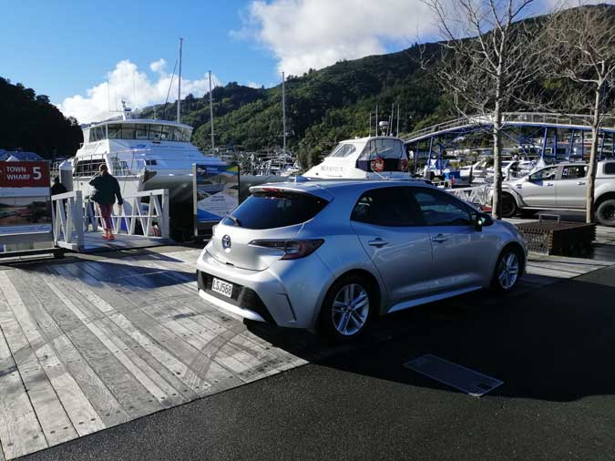 A silver Toyota Corolla parked on the Picton waterfront.