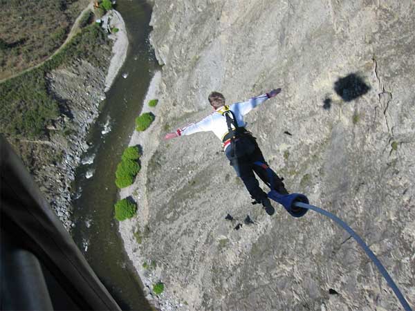 Person leaping off in a bungy jump in Queenstown