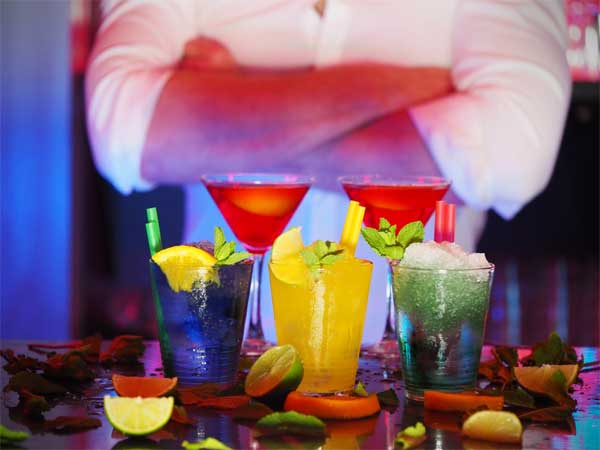 Colourful cocktails in a bar in Queenstown at night