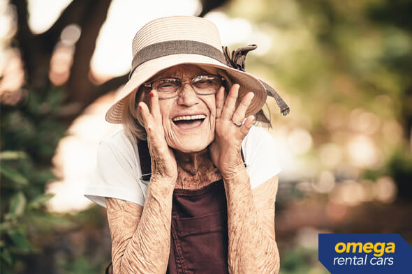 Senior lady shouting happily.