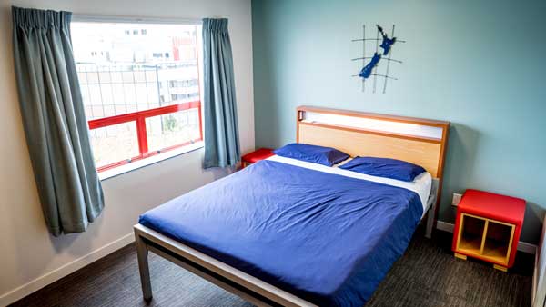 Inside a double room at YHA Auckland